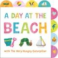A day at the beach with The Very Hungry Caterpillar. Cover Image